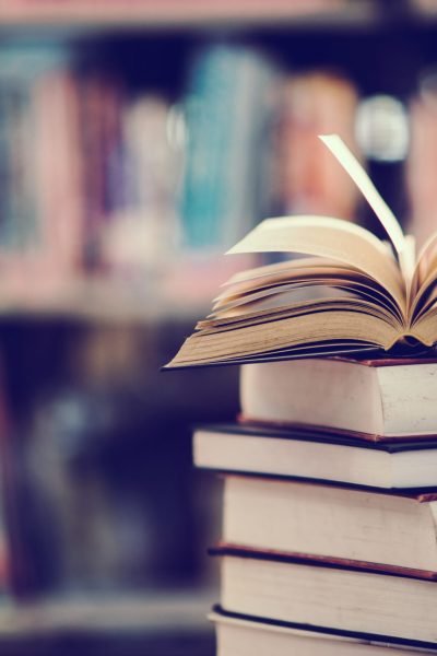 Book in library with open textbook,education learning concept